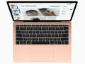 Un MacBook Air color oro rosa aperto, mostra una presentazione su "Our Philosophy" e la lavorazione di ceramiche artigianali. Cos'è il Mac? È questo strumento versatile.