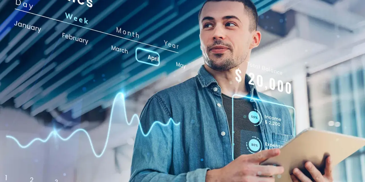 Uomo analizza dati finanziari su tablet, con grafici e statistiche che illustrano cosa sono i sistemi ERP e la gestione aziendale.