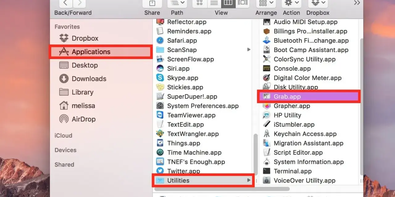 Finestra del Finder su Mac, con la cartella "Applicazioni" selezionata e l'elenco delle utility, tra cui "Grab.app" evidenziato.