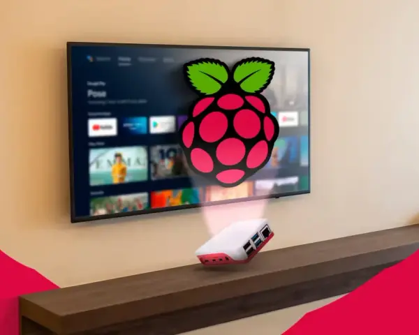 Un Raspberry Pi 3 con logo Raspberry Pi proietta un'interfaccia Android TV su uno schermo.