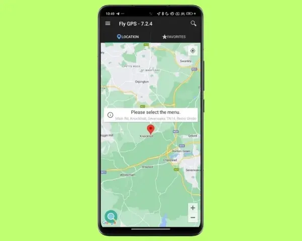 Schermata dell'app Fly GPS con una mappa e un popup che chiede "Please select the menu" per mostrare come inviare la posizione.