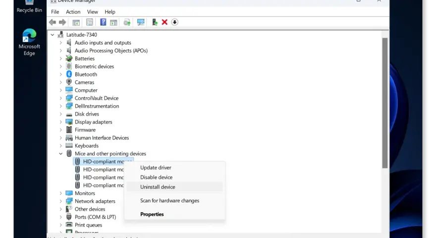 Gestione dispositivi: il tasto destro del mouse non funziona. Opzione "Disinstalla dispositivo" selezionata per un driver HID.