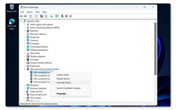 Gestione dispositivi: il tasto destro del mouse non funziona. Opzione "Disinstalla dispositivo" selezionata per un driver HID.
